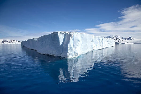 The corner of a tabular iceberg in the ocean