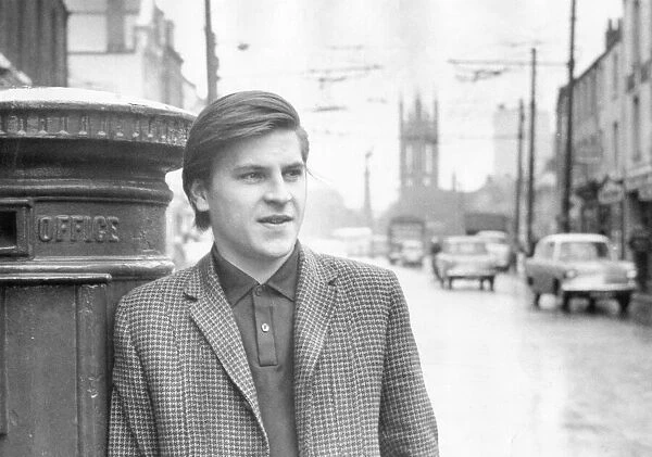 Alan Price posing in Percy Street, Newcastle
