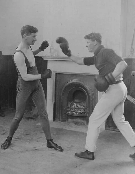 Middle weight boxer Pat O Keefe (Left) seen here sparring. Circa 1919