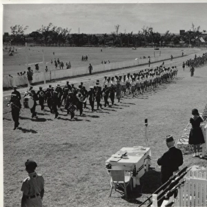 Band of boy scouts marching at a rally, Mauritius