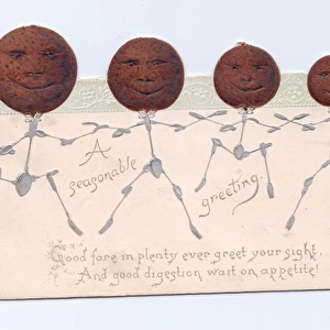 Four humanised puddings on a cutout Christmas card