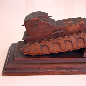 WWI model of a British Whippet tank on a wooden base