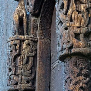 Detail of carved portal arch, Lom Stave Church, Oppland, Gudbrandsdal, Norway, Scandinavia, Europe