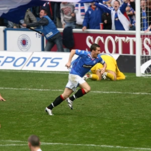 Barry Ferguson's Double Celebration: Rangers Triumphant 3-0 Victory over Celtic in the Clydesdale Bank Premier League