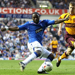 A Battle for Supremacy: Darcheville vs. Reynolds in the Clydesdale Bank Premier League (Rangers 1-0 Motherwell)