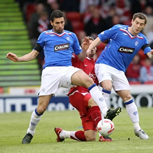 Cuellar and Thomson's Defensive Stand: Aberdeen's 2-0 Victory Over Rangers (Clydesdale Bank Premier League)