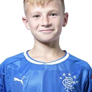 The Next Generation of Champions: Elliot Dunlop and Rangers U12 Holding the Scottish Cup