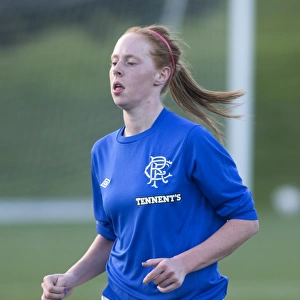 Intense Moment: Kathryn Hill Faces Off Against Hibernian Ladies in Scottish Women's Premier League Soccer Match (Rangers vs Hibernian)