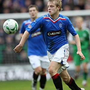 Naismith's Stunner: Rangers Clinch Victory Over Hibernian in Clydesdale Bank Premier League (1-2)