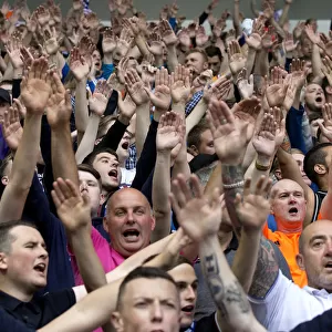 Passionate Rangers Fans Unite: Roaring Pride and Tradition at Ibrox Stadium during Europa League Qualifier vs FC Shkupi (2003 Scottish Cup Winners)