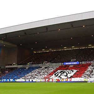 Passionate Rangers Fans: Uniting Ibrox Stadium with Flag Displays during the Rangers vs Celtic Scottish Premiership Match