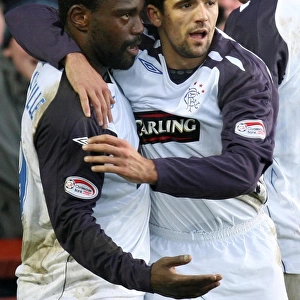 Rangers Darcheville and Novo: Celebrating the Winning Goal Against Inverness Caledonian Thistle in the Clydesdale Bank Premier League
