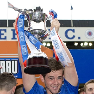 Rangers Football Club: David Templeton Celebrates Promotion to Third Division with Irn Bru Trophy Lift at Ibrox Stadium