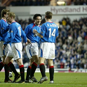 Rangers Football Club: Triumphant Moment - De Boer, Mols, Ball, and Hutton's Euphoric Celebration (23/03/04)