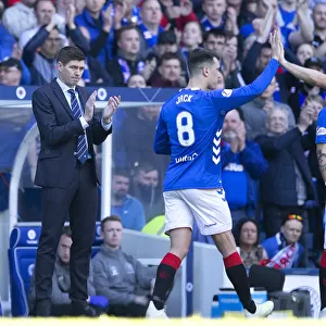Rangers: Kent and Arfield Share a Moment Amidst the Intense Rangers vs Celtic Rivalry at Ibrox Stadium