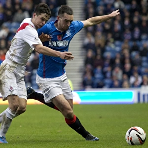 Rangers Lee Wallace in Action: A Battle at Ibrox Stadium against Airdrieonians