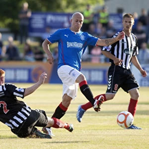 Rangers Nicky Law Scores the Opener: Rangers Take the Lead Against Elgin City