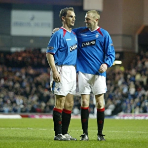 Rangers Ronald de Boer and Stephen Hughes: Celebrating a 4-1 Victory over Dunfermline (23/03/04)