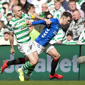 Rangers Ryan Jack Fends Off Celtic's Scott Brown in Scottish Premiership Clash at Celtic Park