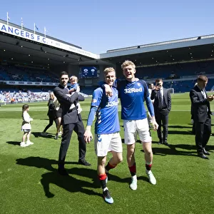Rangers Triumph: McCrorie and Worrall Celebrate Scottish Premiership Victory at Ibrox Stadium