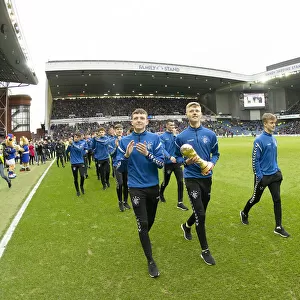 Rangers U17 Team Celebrates Double Victory: Scottish Premiership and Al Kass International Cup Parade at Ibrox Stadium