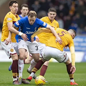 Scott Arfield Fights for Ball in Intense Motherwell vs Rangers Scottish Premiership Clash