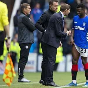 Steven Gerrard Comforts Injured Lassana Coulibaly: A Moment of Compassion at Ibrox Stadium