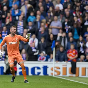 Steven Gerrard Consults with Allan McGregor during Rangers Match at Ibrox Stadium