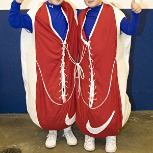 Unconventional Fans in Nike Trainer Costumes: A Quirky Take on Rangers vs Inverness Caley Thistle (1-1) at Ibrox Stadium