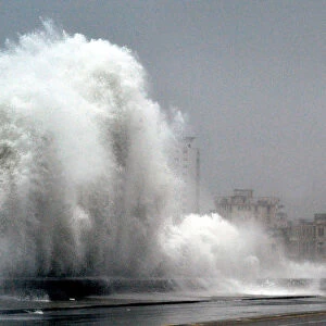 Waves crash against seafront boulevard El Malecon in Havana as Hurricane Rita passes near Cuba