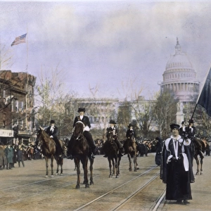 SUFFRAGE PARADE, 1913. Writer, socialite, and R. M. S. Titanic survivor Helen Churchill Hungerford Candee on horseback at the head of the womens suffrage parade at Washington, D. C. 3 March 1913. Oil over a photograph
