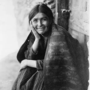 Smiling Native North American Indian woman. Photograph by Edward Curtis (1868-1952)