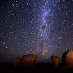 The night sky, stars and The Milky Way over Murphys Haystacks. Large granite outcrops, pillars and boulders. Inselbergs on Eyre Peninsula. South Australia