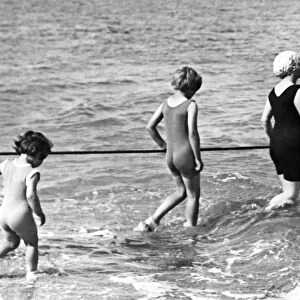 Family Swim Wearing One-Piece Suits