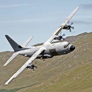 A C-130J Super Hercules low flying over North Wales on a training flight