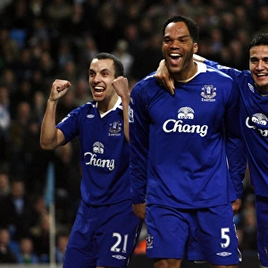 Football - Manchester City v Everton Barclays Premier League - The City of Manchester Stadium - 25 / 2 / 08 Evertons Joleon Lescott (C) celebrates with team mates Leon Osman (L) and Tim Cahill after scoring his sides second goal Mandatory Credit: Action Images / Jason Cairnduff Livepic