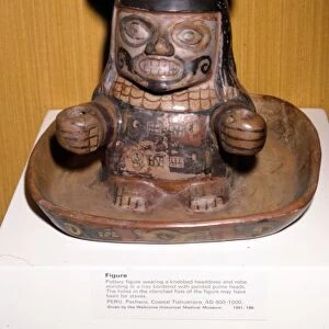 Figure with knobbed headdress and robe, Pacheco Culture, Tiahuanaco, Peru, 600-1000