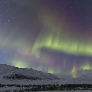 Aurora Borealis At Twilight Above Angelcomb Mountain Along The Dempster Highway; Yukon, Canada