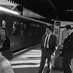 Footballer Terry Venables on his way to work using public transport in London