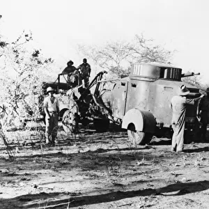 The Gold Coast regiment take Bulo Erillo. An Italian armoured car put out of action at