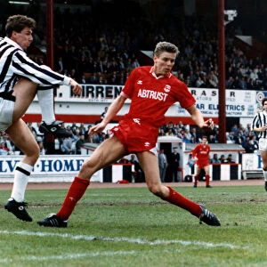 Kevin McGowne football player for St Mirren defends goal from Willem van der Ark of