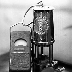 Safety lamp and meter for use in a coal mine. March 1979 P017735