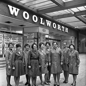 Shop assistants pose outside the New Woolworth store, East Kilbride, 30th January 1970