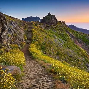 Mountain hiking trail from Pico do Arieiro to Pico Ruivo before sunrise, Madeira Island, Portugal