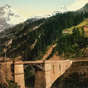 A bridge at the foot of a mountain on which rises the locality of Berisal, at the Sempione Pass in Switzerland
