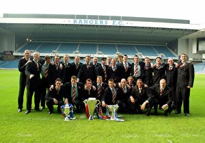 Rangers arrive back at Ibrox after winning the Treble. 31 / 05 / 03